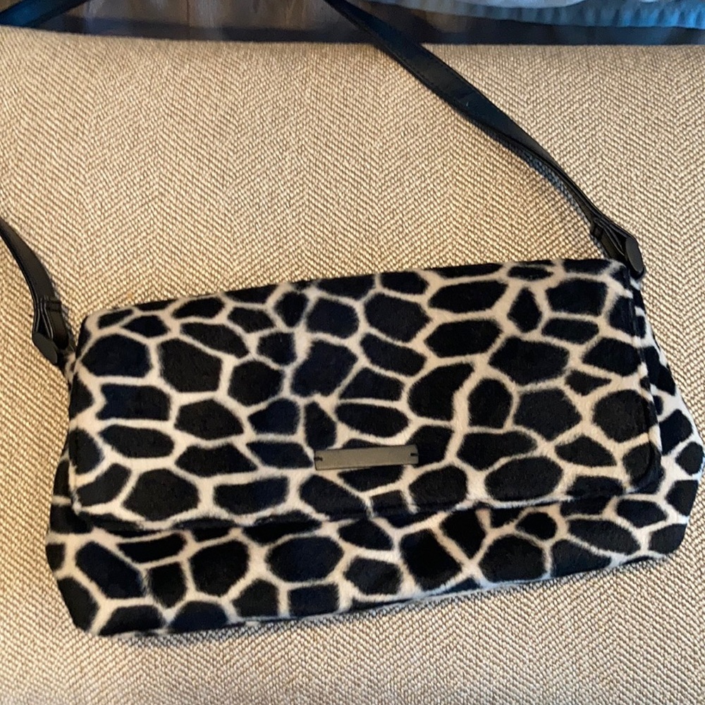 Faux fur, animal print clutch with hot pink lining